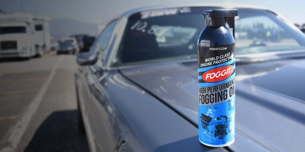 A can of Foggit on top of a drag race car.